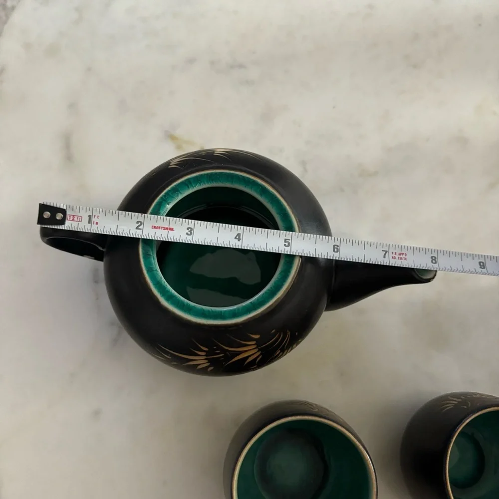 Carved Vietnamese tea kettle set with 2 small tea cups